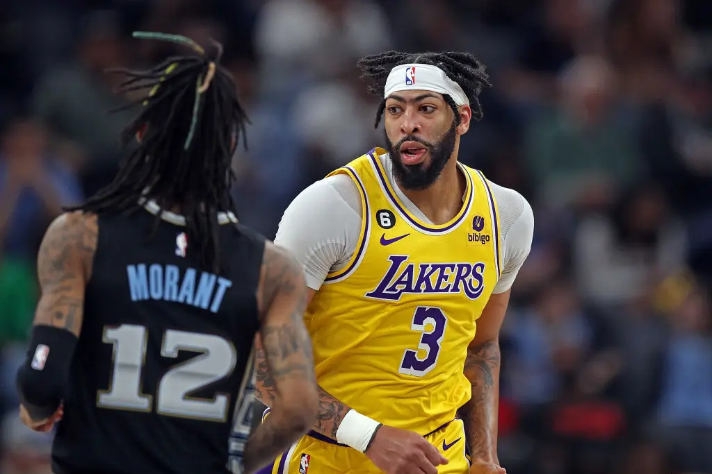 MEMPHIS, TENNESSEE - FEBRUARY 28: Anthony Davis #3 of the Los Angeles Lakers and Ja Morant #12 of the Memphis Grizzlies during the game at FedExForum on February 28, 2023 in Memphis, Tennessee.