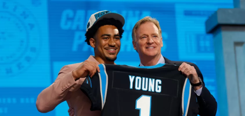 KANSAS CITY, MISSOURI - APRIL 27: (L-R) Bryce Young poses with NFL Commissioner Roger Goodell after being selected first overall by the Carolina Panthers during the first round of the 2023 NFL Draft at Union Station on April 27, 2023 in Kansas City, Missouri