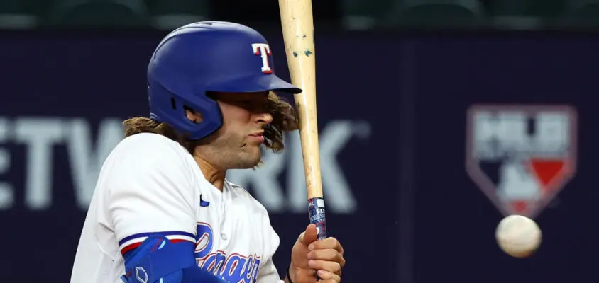 ARLINGTON, TEXAS - APRIL 03: An open cut is seen on the cheek of Josh Smith #47 of the Texas Rangers after being hit by a pitch from Danny Coulombe of the Baltimore Orioles in the third inning at Globe Life Field on April 03, 2023 in Arlington, Texas.