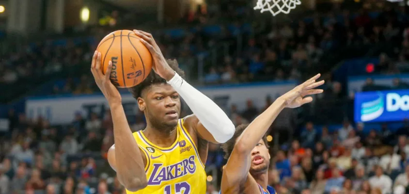 OKLAHOMA CITY, OKLAHOMA - MARCH 01: Mo Bamba #12 of the Los Angeles Lakers grabs a rebound over Aaron Wiggins #21 of the Oklahoma City Thunder during the second quarter at Paycom Center on March 01, 2023 in Oklahoma City, Oklahoma.