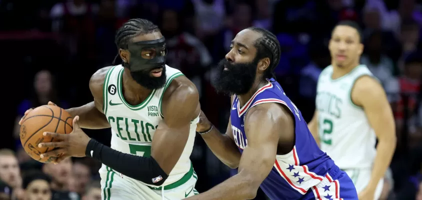 PHILADELPHIA, PENNSYLVANIA - MAY 07: Jaylen Brown #7 of the Boston Celtics looks to pass against James Harden #1 of the Philadelphia 76ers during the third quarter in game four of the Eastern Conference Second Round Playoffs at Wells Fargo Center on May 07, 2023 in Philadelphia, Pennsylvania