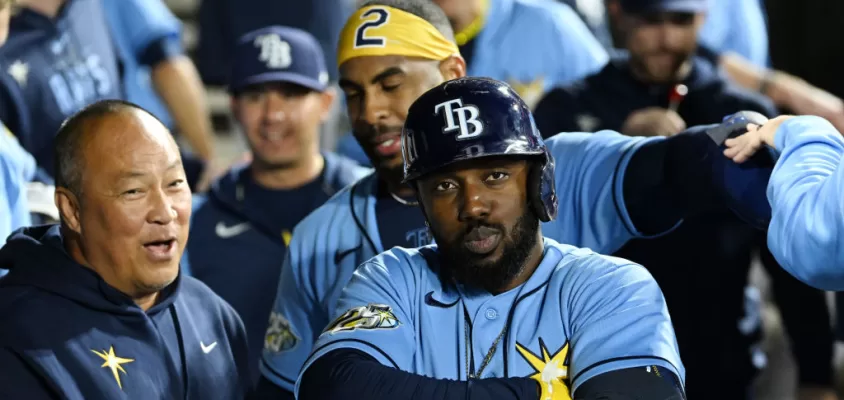 CHICAGO, ILLINOIS - APRIL 29: Randy Arozarena #56 of the Tampa Bay Rays reacts in the dugout with teammates after this three run home run in the seventh inning against the Chicago White Sox at Guaranteed Rate Field on April 29, 2023 in Chicago, Illinois.