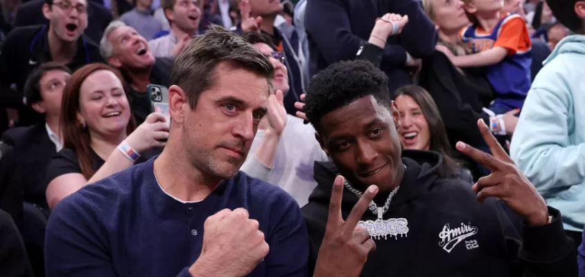 NEW YORK, NEW YORK - MAY 02: New York Jets quarterback Aaron Rodgers and cornerback Sauce Gardner attend game two of the Eastern Conference Semifinals between the New York Knicks and the Miami Heat at Madison Square Garden on May 02, 2023 in New York City. The New York Knicks defeated the Miami Heat 111-105.