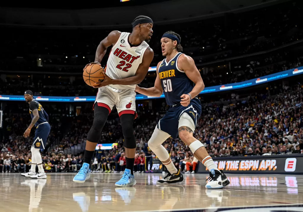 DENVER, CO - JUNE 4: Aaron Gordon (50) of the Denver Nuggets defends Jimmy Butler (22) of the Miami Heat in the first quarter during Game 2 of the NBA Finals at Ball Arena in Denver on Sunday, June 4, 2023