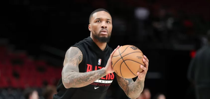 PORTLAND, OREGON - MARCH 01: Damian Lillard #0 of the Portland Trail Blazers warms up before a game against the New Orleans Pelicans at Moda Center on March 01, 2023 in Portland, Oregon.