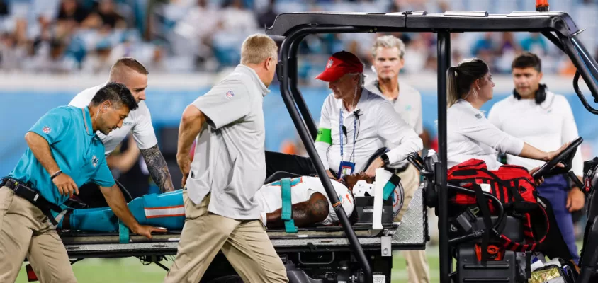 JACKSONVILLE, FL - AUGUST 26: Wide Receiver Daewood Davis of the Miami Dolphins is taken off the field on a cart after an injury during a preseason game against the Jacksonville Jaguars at TIAA Bank Field on January 26, 2023 in Jacksonville, Florida. The Jaguars defeated the Dolphins 31 to 18.