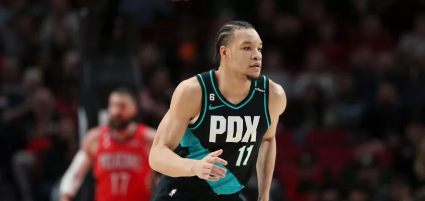 PORTLAND, OREGON - MARCH 27: Kevin Knox II #11 of the Portland Trail Blazers runs down the court during the first quarter against the New Orleans Pelicans at Moda Center on March 27, 2023 in Portland, Oregon.