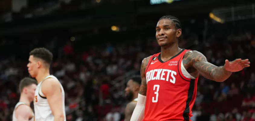 HOUSTON, TEXAS - APRIL 04: Kevin Porter Jr. #3 of the Houston Rockets reacts after a play during the game against the Denver Nuggets at Toyota Center on April 04, 2023 in Houston, Texas.