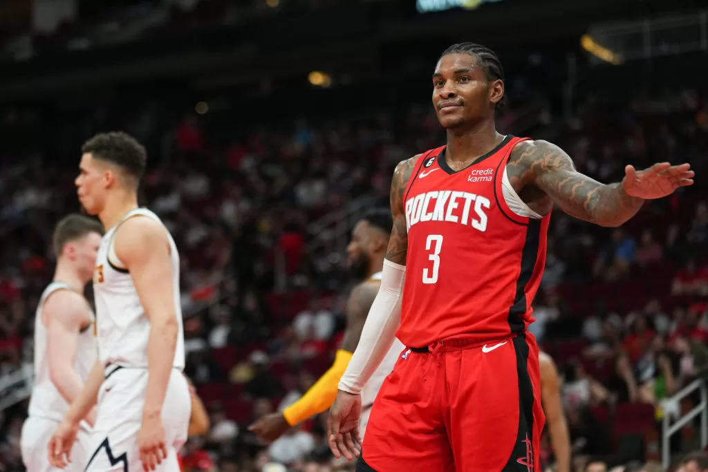 HOUSTON, TEXAS - APRIL 04: Kevin Porter Jr. #3 of the Houston Rockets reacts after a play during the game against the Denver Nuggets at Toyota Center on April 04, 2023 in Houston, Texas.