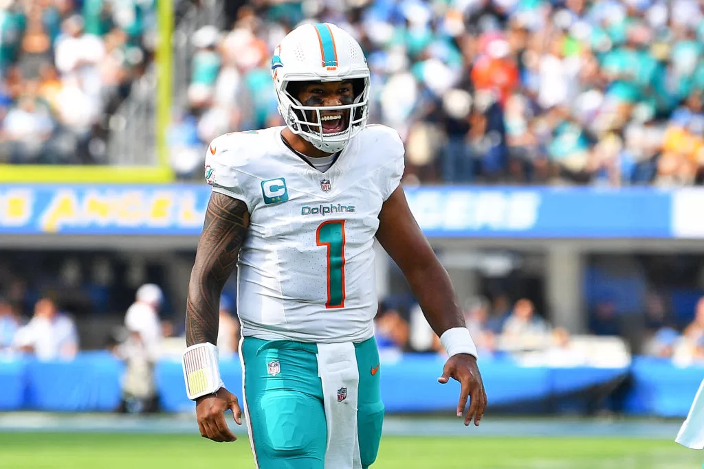 INGLEWOOD, CA - SEPTEMBER 10: Miami Dolphins quarterback Tua Tagovailoa (1) celebrates after throwing for a touchdown during the NFL regular season game between the Miami Dolphins and the Los Angeles Chargers on September 10, 2023, at SoFi Stadium in Inglewood, CA.