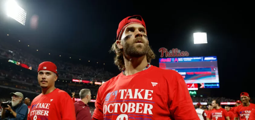 PHILADELPHIA, PENNSYLVANIA - OCTOBER 04: Bryce Harper #3 of the Philadelphia Phillies reacts after defeating the Miami Marlins 7-1 in Game Two of the Wild Card Series at Citizens Bank Park on October 04, 2023 in Philadelphia, Pennsylvania