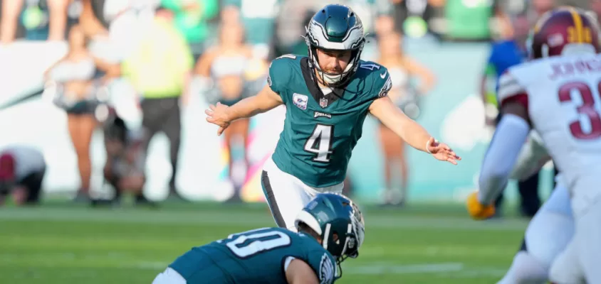 PHILADELPHIA, PA - OCTOBER 01: Philadelphia Eagles place kicker Jake Elliott (4) kicks an overtime field goal for the win during the game between the Philadelphia Eagles and the Washington Commanders on October 1, 2023, at Lincoln Financial Field