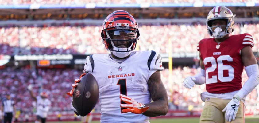 SANTA CLARA, CALIFORNIA - OCTOBER 29: Ja'Marr Chase #1 of the Cincinnati Bengals catches a pass for a touchdown against Isaiah Oliver #26 of the San Francisco 49ers during the third quarter at Levi's Stadium on October 29, 2023 in Santa Clara, California.