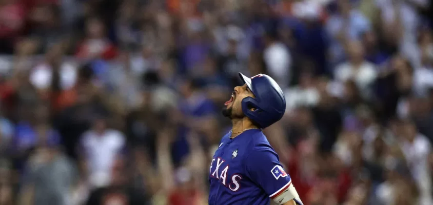 PHOENIX, ARIZONA - NOVEMBER 01: Marcus Semien #2 of the Texas Rangers rounds the bases after hitting a home run in the ninth inning against the Arizona Diamondbacks during Game Five of the World Series at Chase Field on November 01, 2023 in Phoenix, Arizona