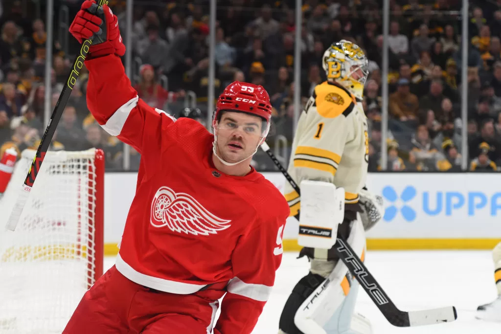 BOSTON, MASSACHUSETTS - NOVEMBER 24: Alex DeBrincat #93 of the Detroit Red Wings celebrates the first-period goal against the Boston Bruins on November 24, 2023 at the TD Garden in Boston, Massachusetts.