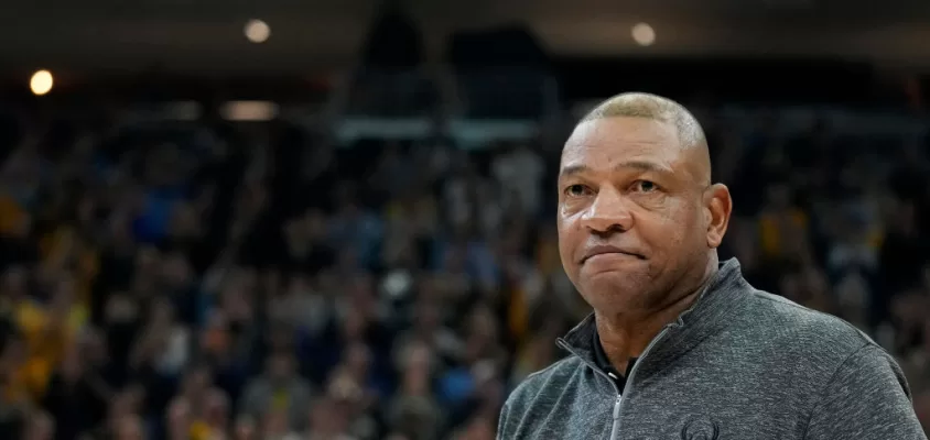 MILWAUKEE, WISCONSIN - JANUARY 27: Head coach Doc Rivers of the Milwaukee Bucks speaks to the crowd in the first half of the game between the Seton Hall Pirates and Marquette Golden Eagles at Fiserv Forum on January 27, 2024 in Milwaukee, Wisconsin