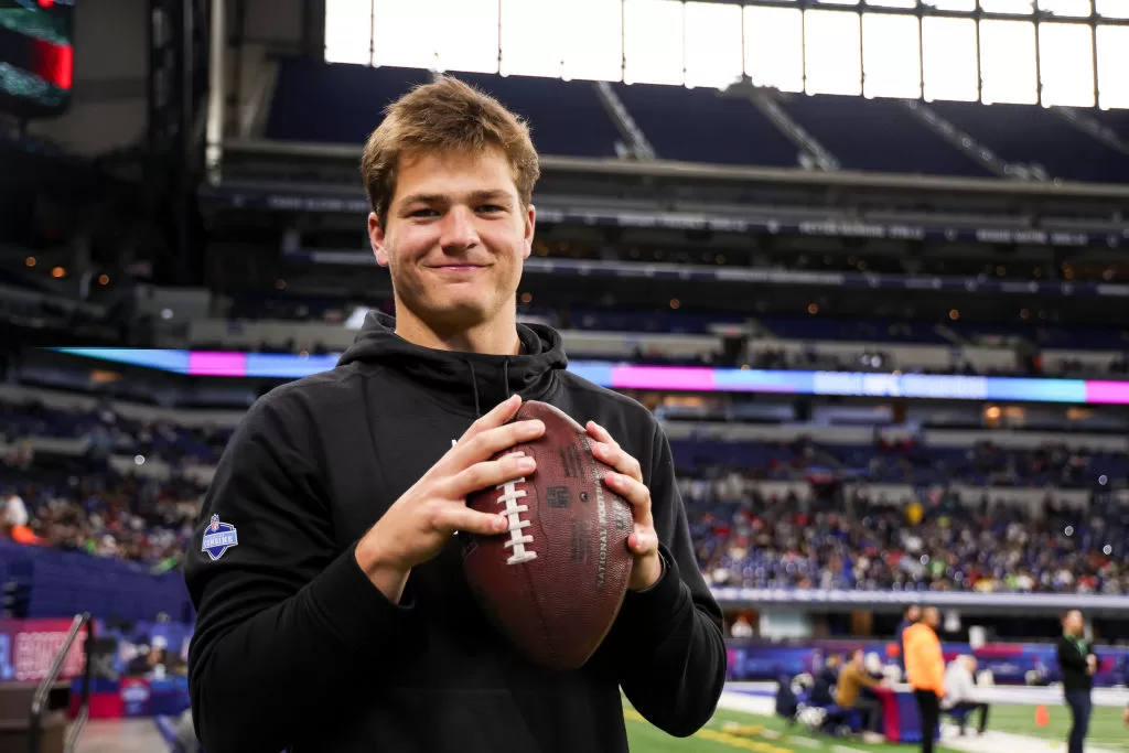 INDIANAPOLIS, INDIANA - MARCH 2: Drake Maye #QB04 of North Carolina holds a football during the NFL Scouting Combine at Lucas Oil Stadium on March 2, 2024 in Indianapolis, Indiana