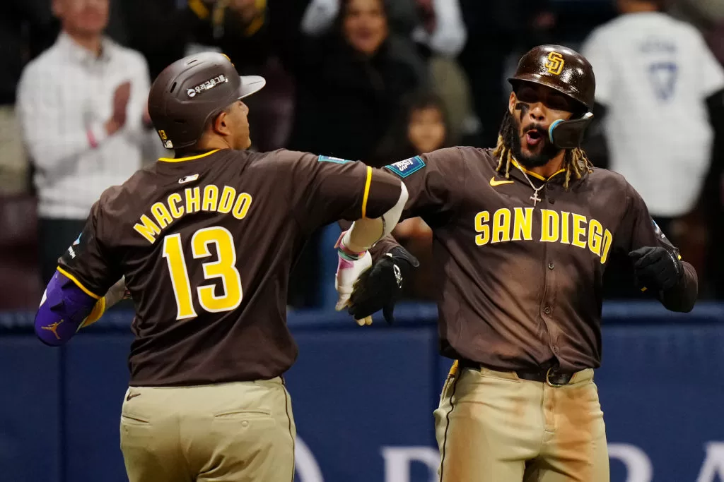 SEOUL, SOUTH KOREA - MARCH 21: Manny Machado #13 of the San Diego Padres celebrates with teammate Fernando Tatis Jr. #23 after hitting a three-run home run in the ninth inning during the 2024 Seoul Series game between the San Diego Padres and the Los Angeles Dodgers at Gocheok Sky Dome on Thursday, March 21, 2024 in Seoul, California