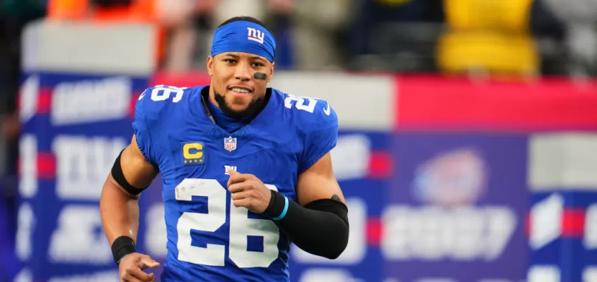 EAST RUTHERFORD, NJ - JANUARY 07: Saquon Barkley #26 of the New York Giants takes the field before kickoff against the Philadelphia Eagles at MetLife Stadium on January 7, 2024 in East Rutherford, New Jersey