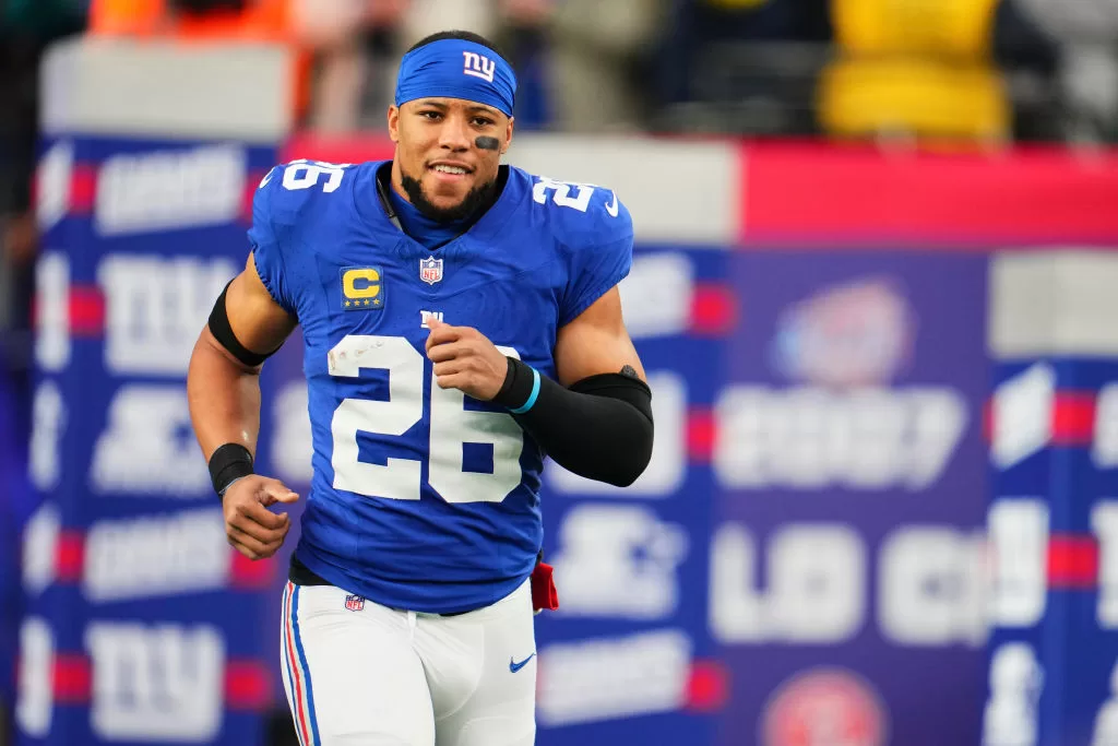 EAST RUTHERFORD, NJ - JANUARY 07: Saquon Barkley #26 of the New York Giants takes the field before kickoff against the Philadelphia Eagles at MetLife Stadium on January 7, 2024 in East Rutherford, New Jersey