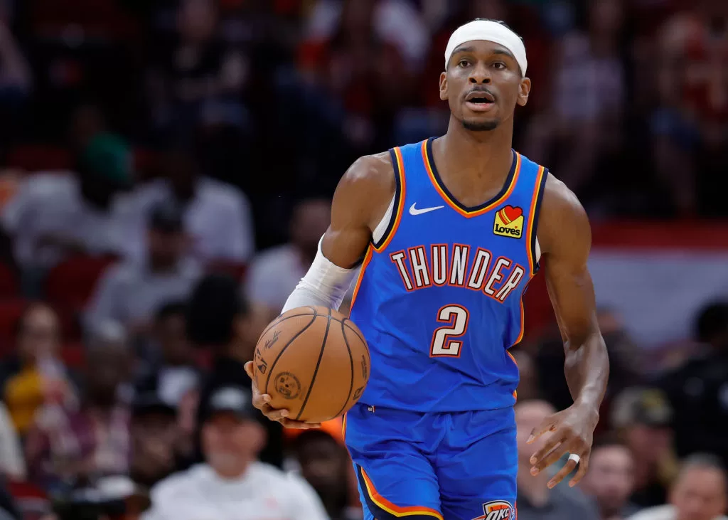 HOUSTON, TEXAS - FEBRUARY 25: Shai Gilgeous-Alexander #2 of the Oklahoma City Thunder controls the ball against the Houston Rockets during the first half at Toyota Center on February 25, 2024 in Houston, Texas.