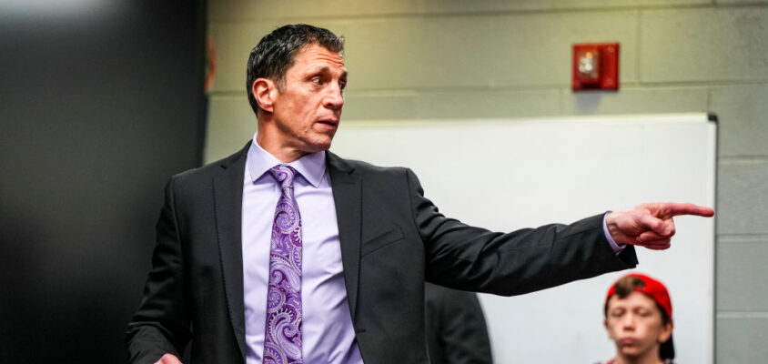 RALEIGH, NORTH CAROLINA - MARCH 21: Carolina Hurricanes head coach Rod Brind'Amour talks in the locker room after an NHL hockey game against the Philadelphia Flyers at PNC Arena on March 21, 2024 in Raleigh, North Carolina.