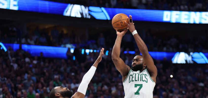 DALLAS, TEXAS - JUNE 12: Jaylen Brown #7 of the Boston Celtics attempts a shot while being guarded by Tim Hardaway Jr. #10 of the Dallas Mavericks in the fourth quarter in Game Three of the 2024 NBA Finals at American Airlines Center on June 12, 2024 in Dallas, Texas.