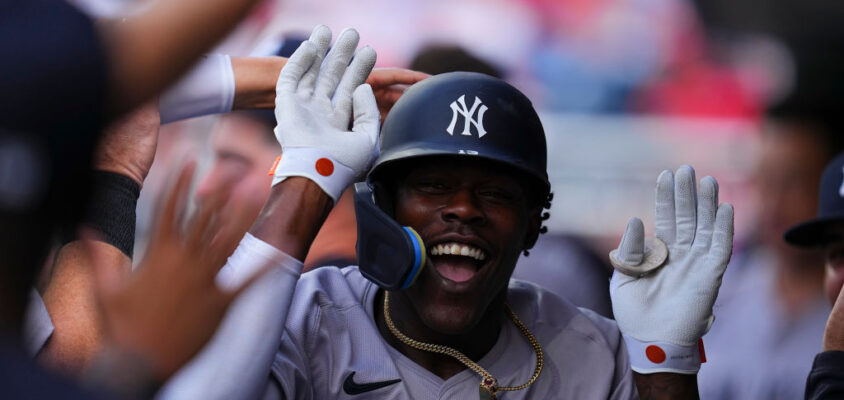 PHILADELPHIA, PENNSYLVANIA - JULY 29: Jazz Chisholm Jr. #13 of the New York Yankees celebrates with teammates after hitting a solo home run in the top of the second inning against the Philadelphia Phillies at Citizens Bank Park on July 29, 2024 in Philadelphia, Pennsylvania