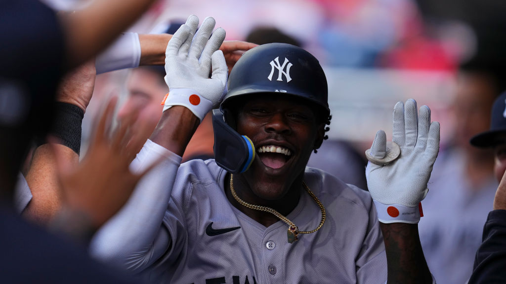 PHILADELPHIA, PENNSYLVANIA - JULY 29: Jazz Chisholm Jr. #13 of the New York Yankees celebrates with teammates after hitting a solo home run in the top of the second inning against the Philadelphia Phillies at Citizens Bank Park on July 29, 2024 in Philadelphia, Pennsylvania