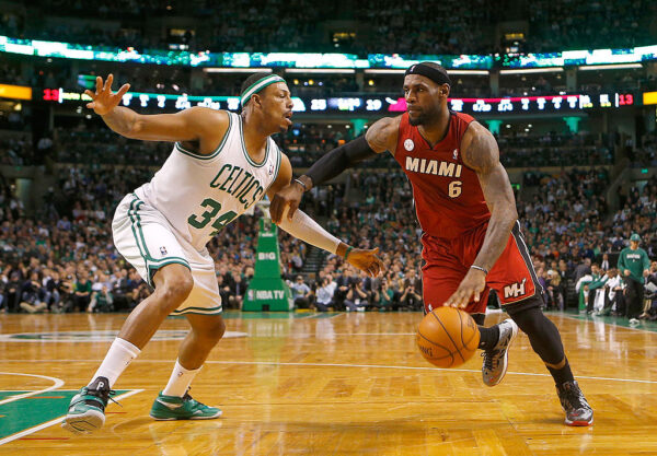 BOSTON, MA - MARCH 18: LeBron James #6 of the Miami Heat drives against Paul Pierce #34 of the Boston Celtics on March 18, 2013 at the TD Garden in Boston, Massachusetts