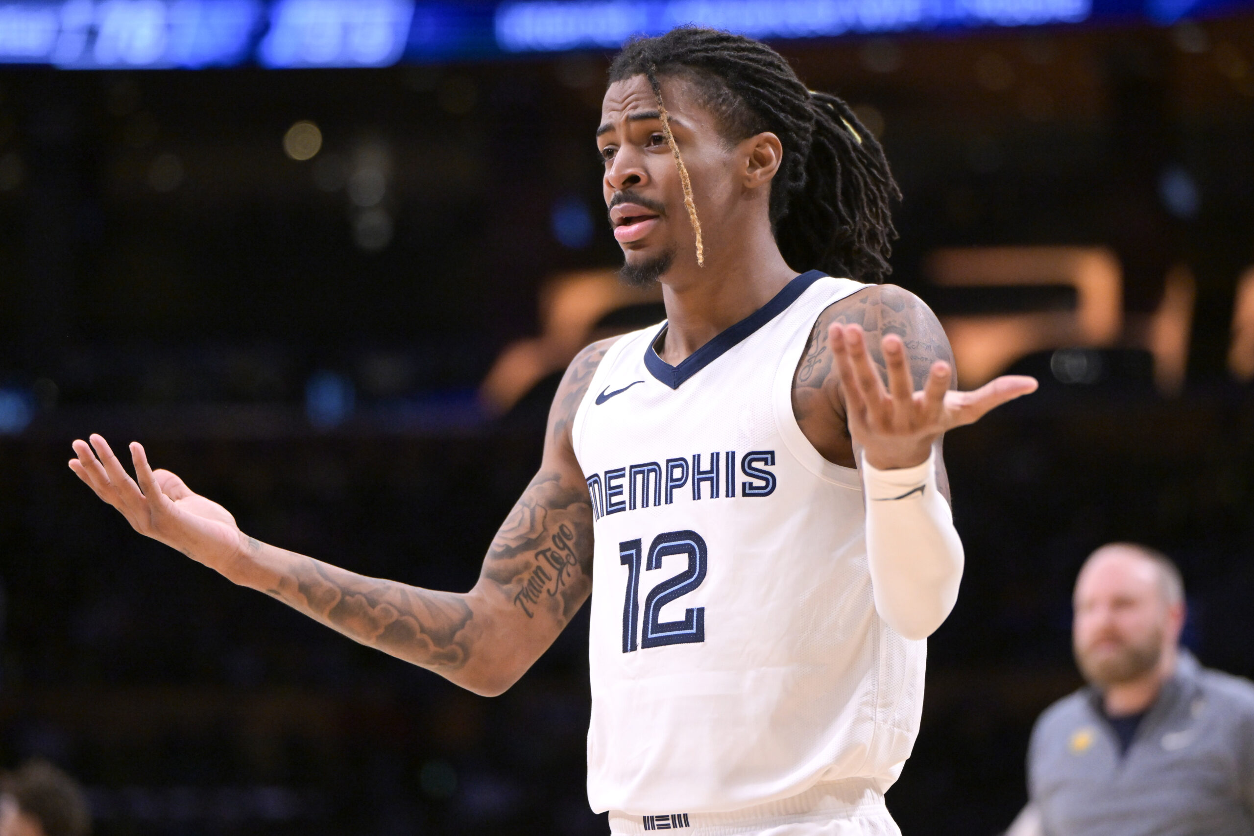 Jan 5, 2024; Los Angeles, California, USA; Memphis Grizzlies guard Ja Morant (12) reacts in the second half against the Los Angeles Lakers at Crypto.com Arena.