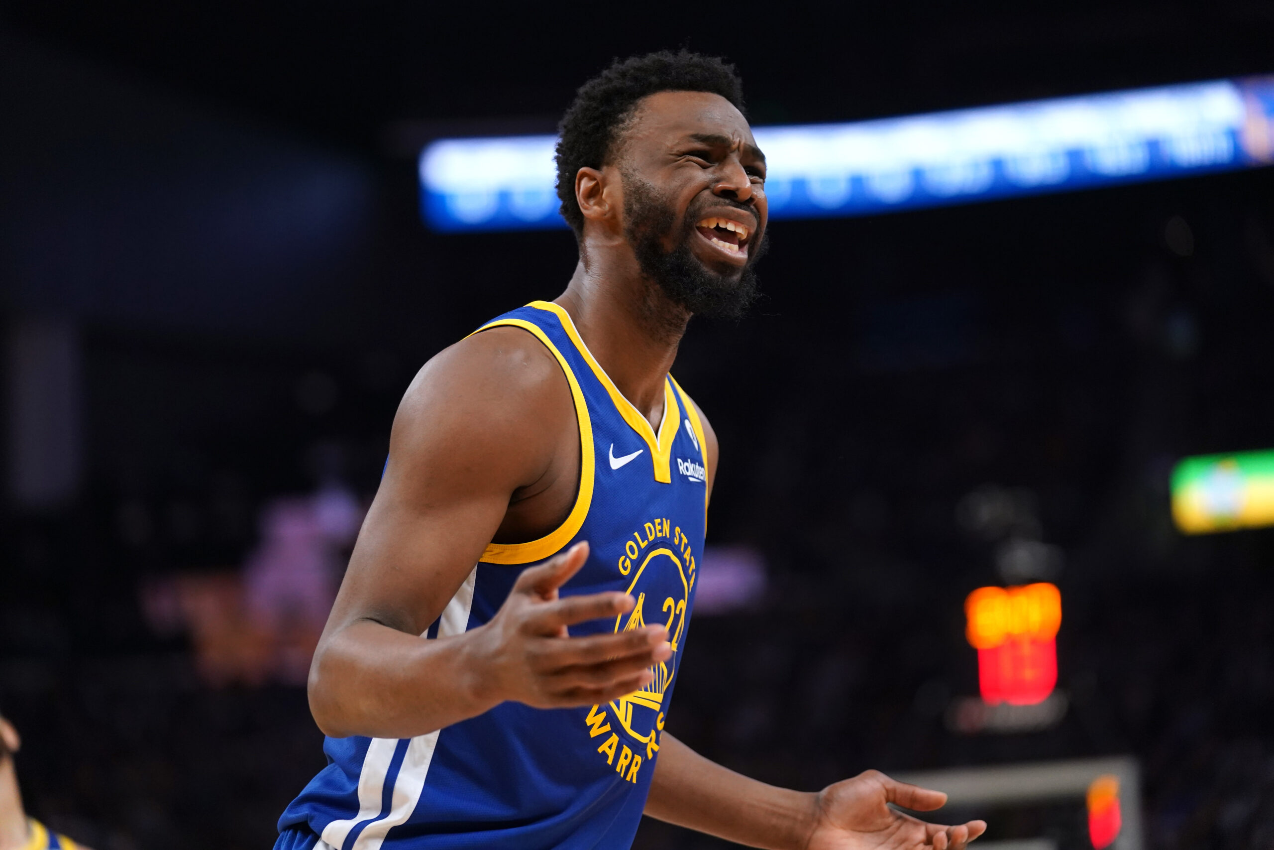 Apr 2, 2024; San Francisco, California, USA; Golden State Warriors forward Andrew Wiggins (22) reacts after being called for a foul against the Dallas Mavericks in the second quarter at the Chase Center.