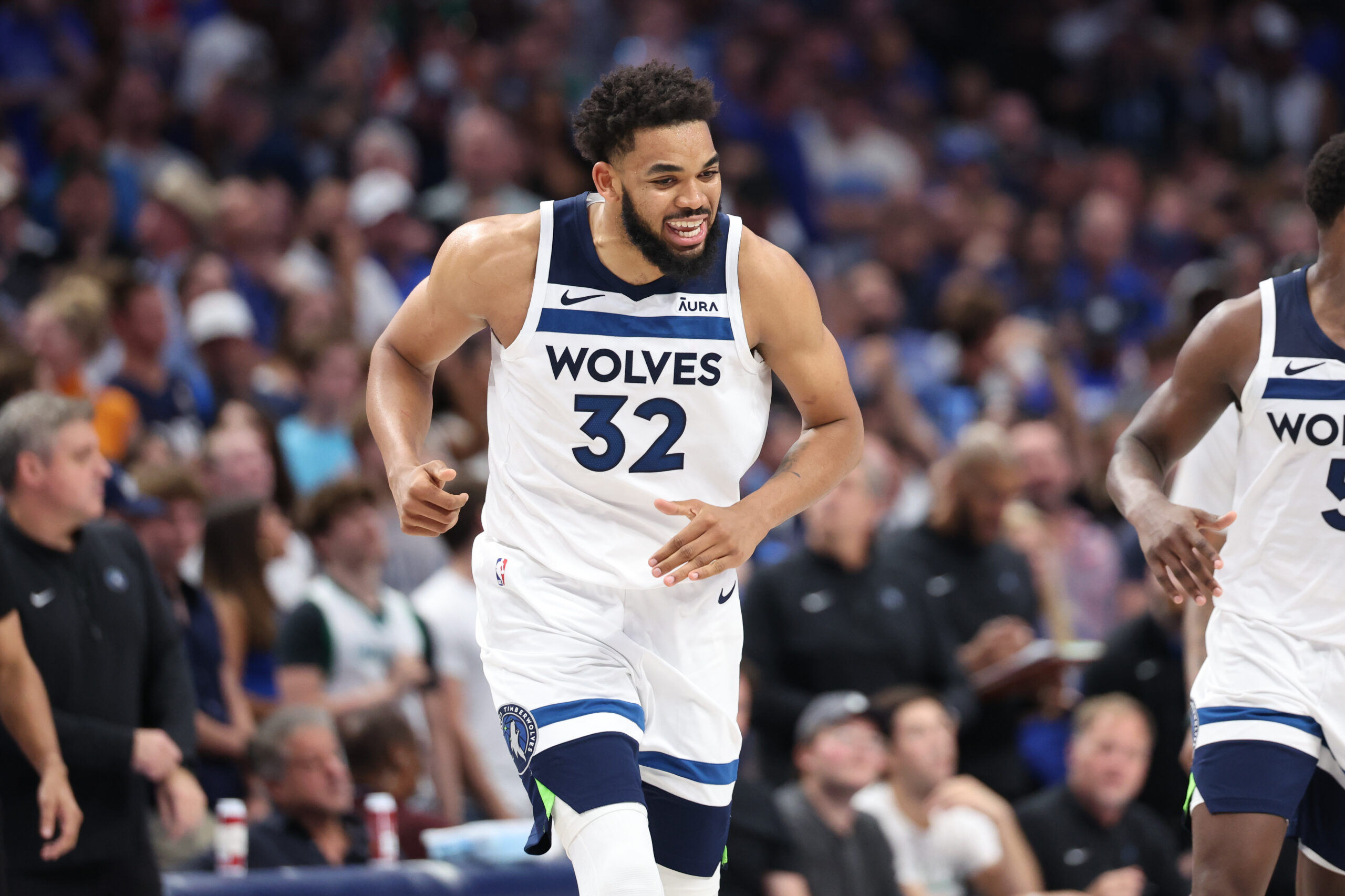 May 28, 2024; Dallas, Texas, USA; Minnesota Timberwolves center Karl-Anthony Towns (32) reacts against the Dallas Mavericks during the fourth quarter of game four of the western conference finals for the 2024 NBA playoffs at American Airlines Center.