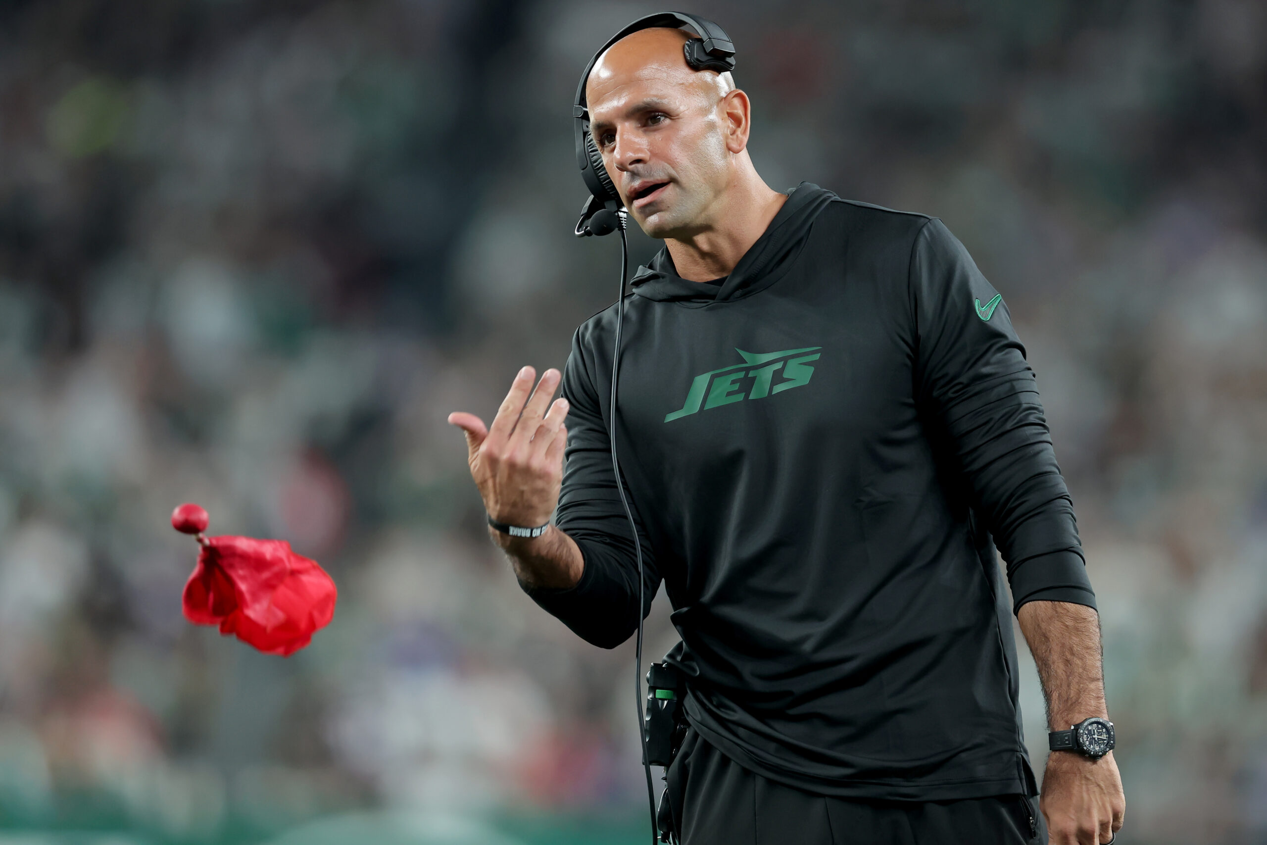 Sep 19, 2024; East Rutherford, New Jersey, USA; New York Jets head coach Robert Saleh throws a challenge flag during the second quarter against the New England Patriots at MetLife Stadium.