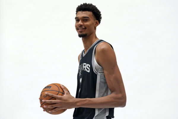 Sep 30, 2024; San Antonio, TX, USA; San Antonio Spurs center Victor Wembanyama (1) poses for photos during Media day at Victory Capital Performance Center in San Antonio.