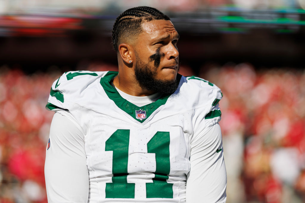 SANTA CLARA, CA - SEPTEMBER 9: Linebacker Jermaine Johnson #11 of the New York Jets stands on the sidelines during the national anthem prior an NFL football game against the San Francisco 49ers, at Levi's Stadium on September 9, 2024 in Santa Clara, California