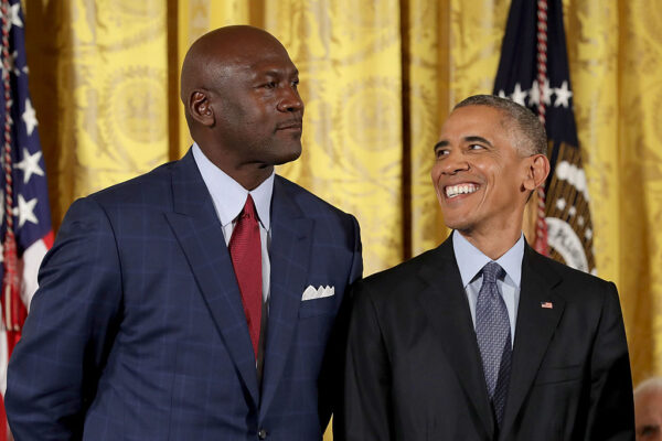 WASHINGTON, DC - NOVEMBER 22: U.S. President Barack Obama smiles up at National Basketball Association Hall of Fame member and legendary athlete Michael Jordan before awarding him with the Presidential Medal of Freedom during a ceremony in the East Room of the White House November 22, 2016 in Washington, DC. Obama presented the medal to 19 living and two posthumous pioneers in science, sports, public service, human rights, politics and the arts. (Photo by Chip Somodevilla/Getty Images)