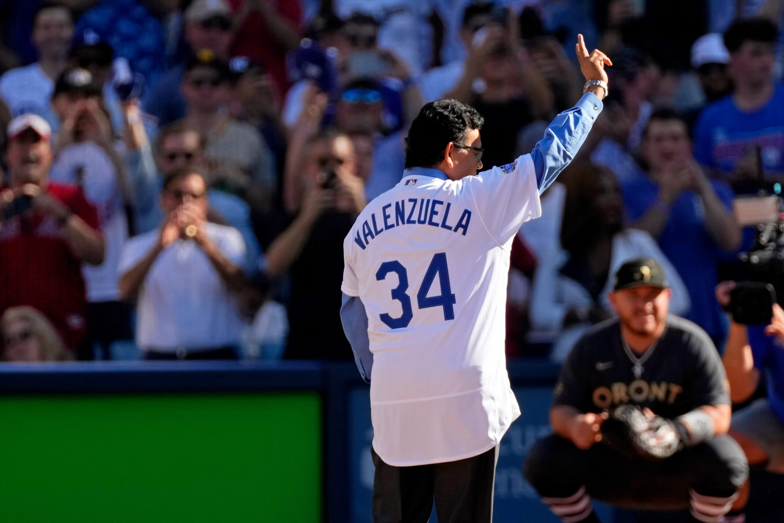 Jul 19, 2022; Los Angeles, California, USA; Los Angeles Dodgers former pitcher Fernando Valenzuela waves to the crowd before throwing a ceremonial first pitch before the 2022 MLB All Star Game at Dodger Stadium. Mandatory Credit: Robert Hanashiro-USA TODAY Sports