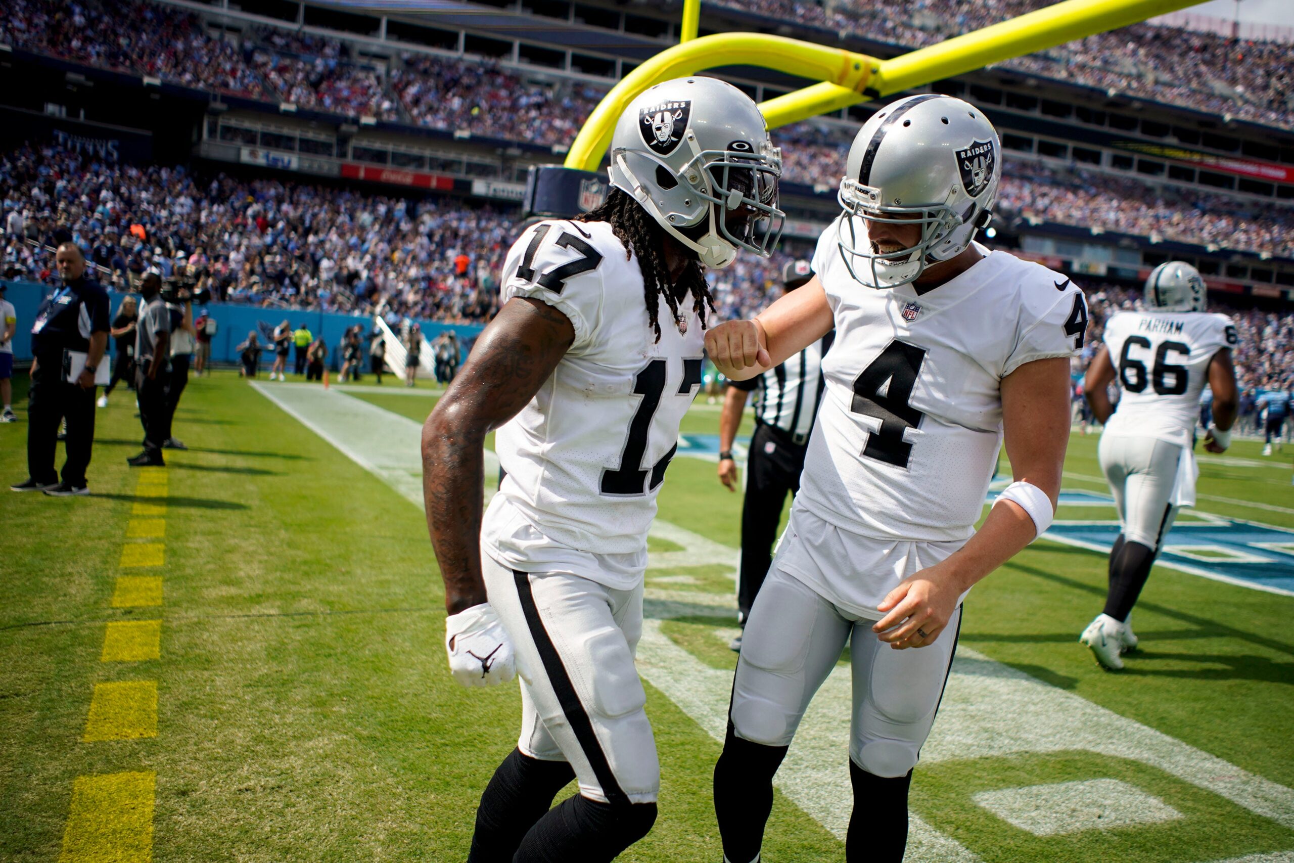 Las Vegas Raiders wide receiver Davante Adams (17) celebrates his touch down with quarterback Derek Carr (4) during the second quarter at Nissan Stadium Sunday, Sept. 25, 2022, in Nashville, Tenn.