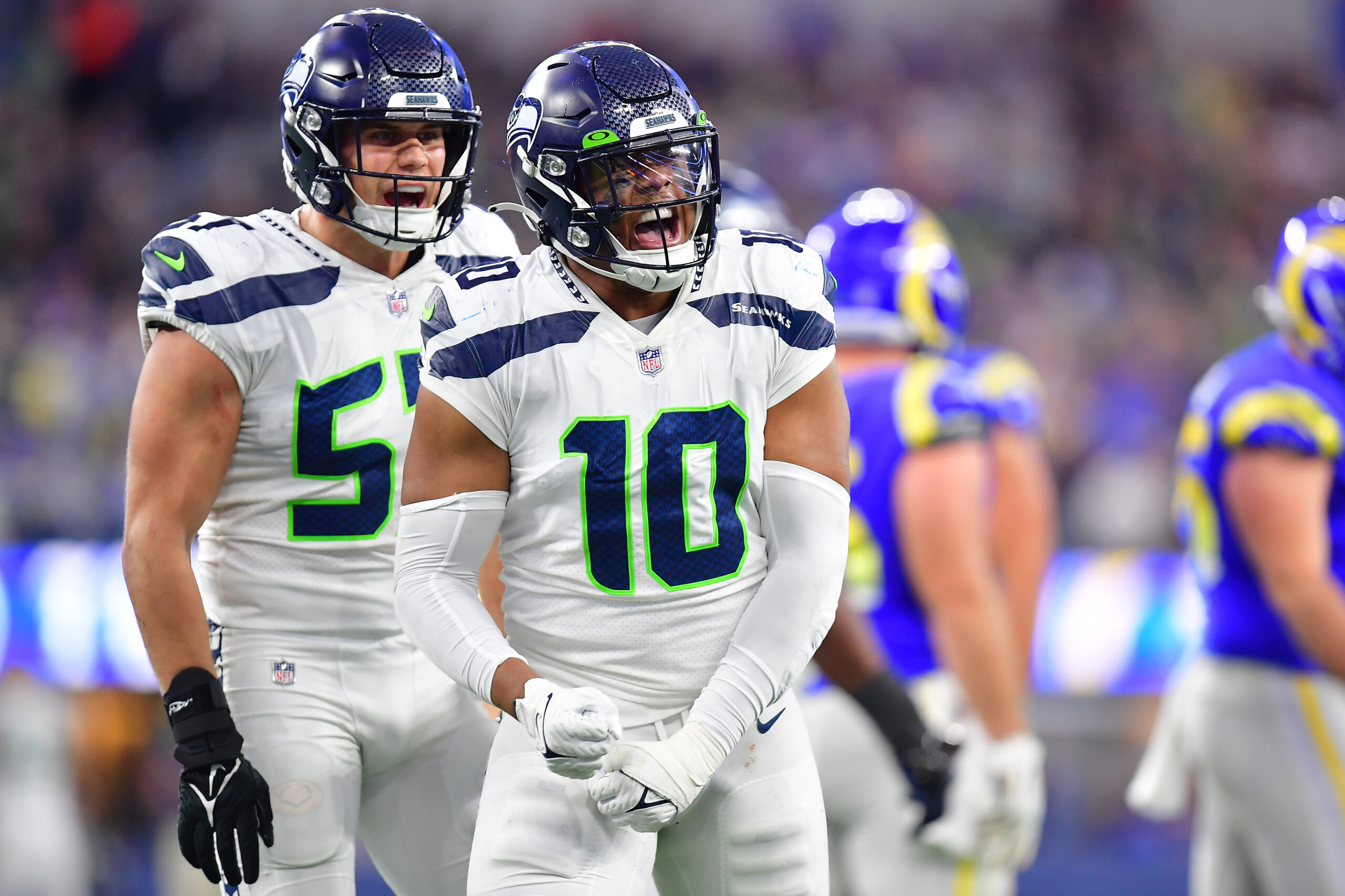 Dec 4, 2022; Inglewood, California, USA; Seattle Seahawks linebacker Uchenna Nwosu (10) and linebacker Cody Barton (57) react against the Los Angeles Rams during the second half at SoFi Stadium. Mandatory Credit: Gary A. Vasquez-USA TODAY Sports