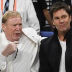 Oct 8, 2023; Las Vegas, Nevada, USA; Las Vegas Aces owner Mark Davis and part-owner Tom Brady talk before the game between the Las Vegas Aces and the New York Liberty during game one of the 2023 WNBA Finals at Michelob Ultra Arena. Mandatory Credit: Candice Ward-USA TODAY Sports