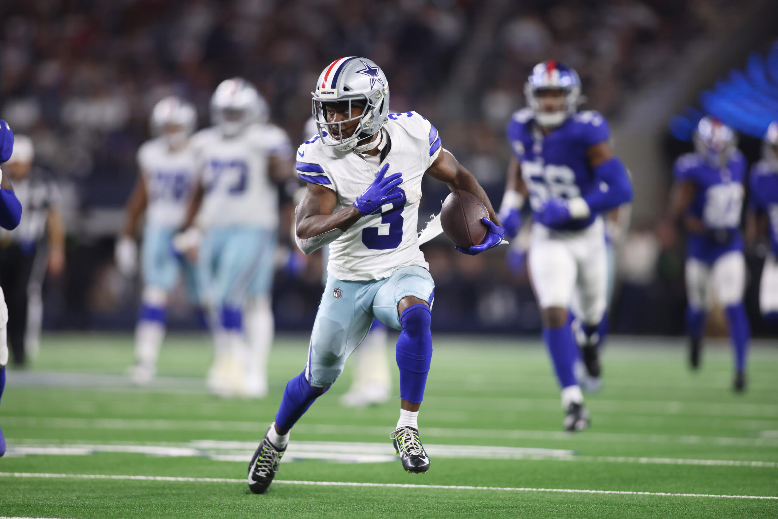 Nov 12, 2023; Arlington, Texas, USA; Dallas Cowboys wide receiver Brandin Cooks (3) runs with the ball after catching a pass against the New York Giants in the third quarter at AT&T Stadium.