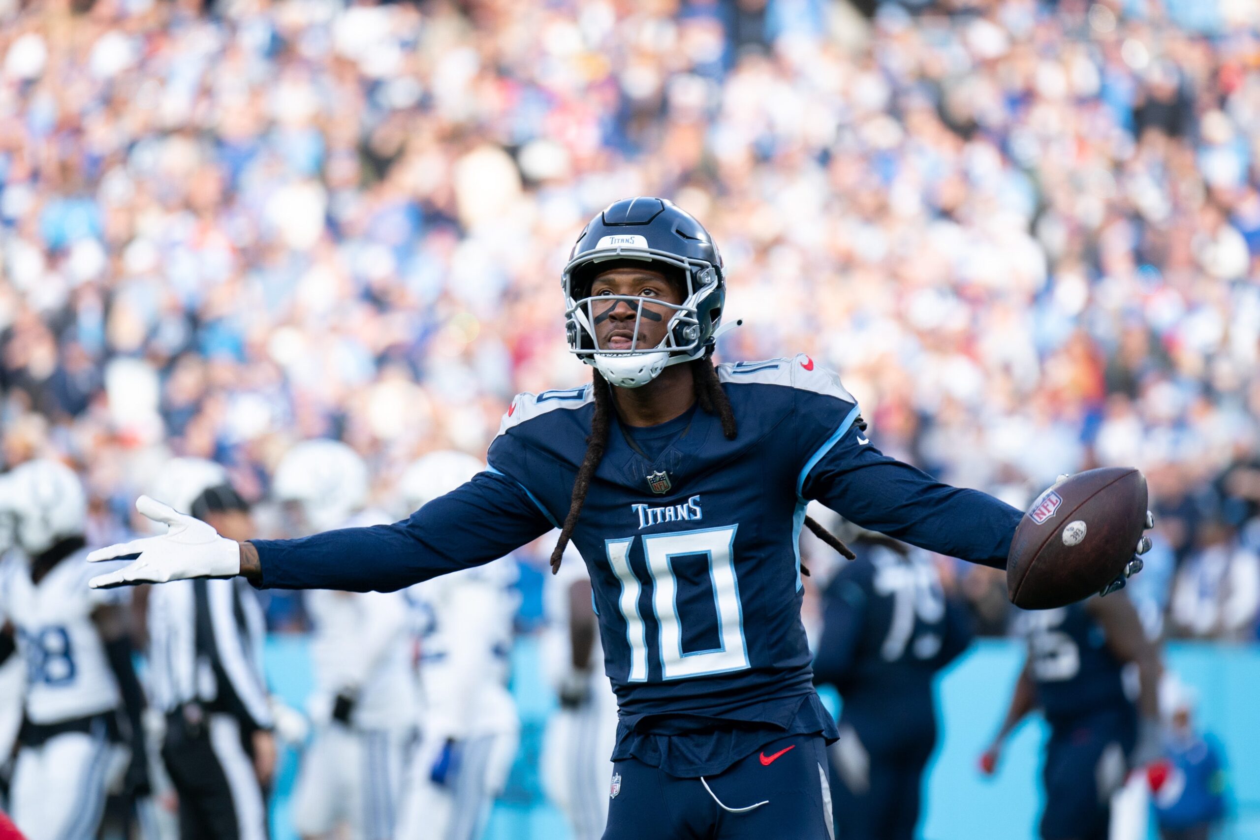 Tennessee Titans wide receiver DeAndre Hopkins (10) celebrates a touchdown against the Indianapolis Colts in the fourth quarter during their game at Nissan Stadium in Nashville, Tenn., Sunday, Dec. 3, 2023.