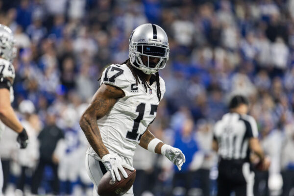 Dec 31, 2023; Indianapolis, Indiana, USA; NFL - Las Vegas Raiders wide receiver Davante Adams (17) celebrates his touchdown in the second half against the Indianapolis Colts at Lucas Oil Stadium. Mandatory Credit: Trevor Ruszkowski-USA TODAY Sports