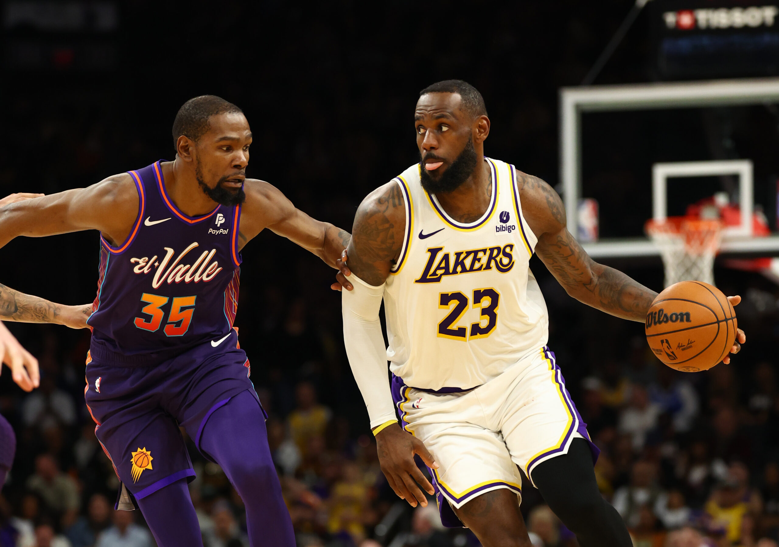 Feb 25, 2024; Phoenix, Arizona, USA; NBA; Los Angeles Lakers forward LeBron James (23) against Phoenix Suns forward Kevin Durant (35) at Footprint Center.