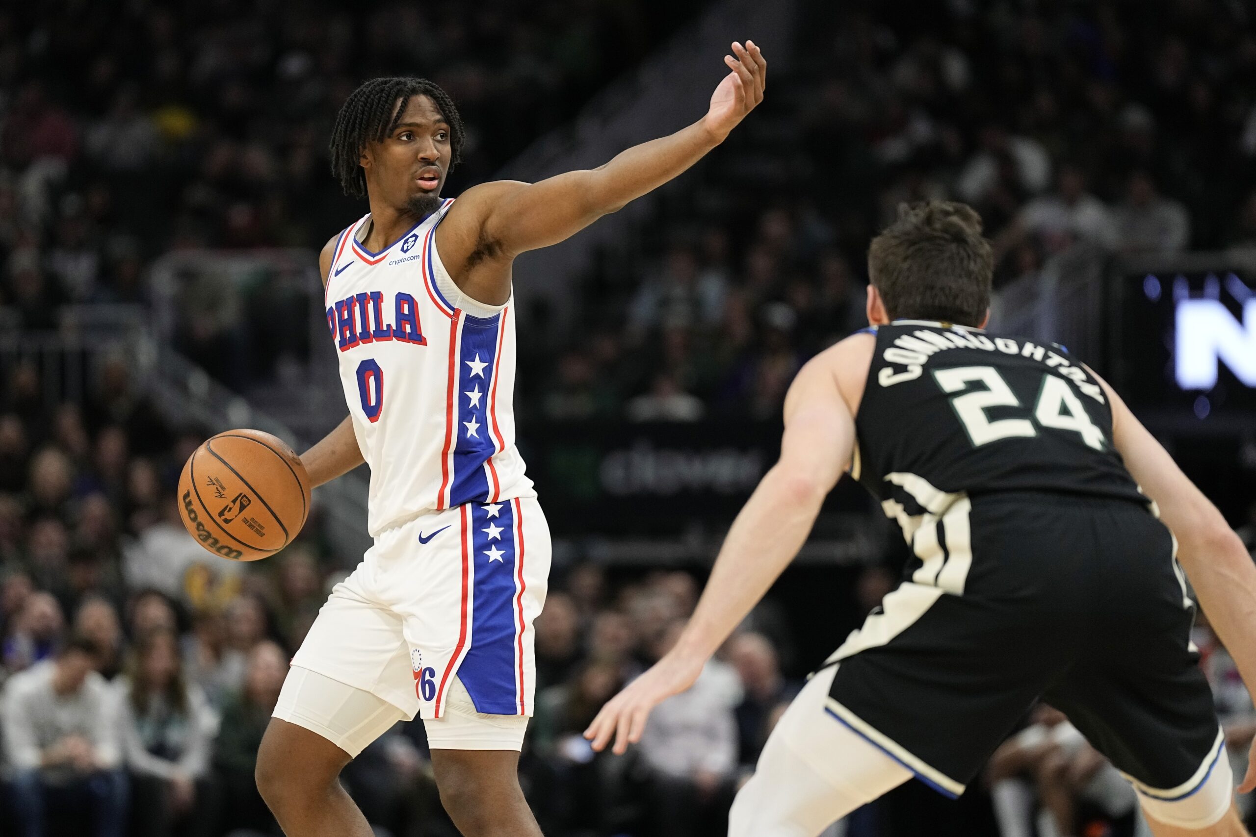 Mar 14, 2024; Milwaukee, Wisconsin, USA; Philadelphia 76ers guard Tyrese Maxey (0) gestures during the fourth quarter against the Milwaukee Bucks at Fiserv Forum.