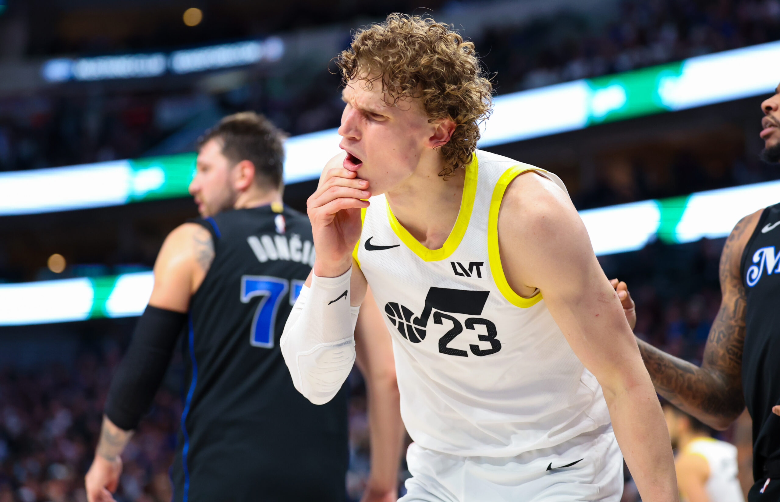 Mar 21, 2024; Dallas, Texas, USA; Utah Jazz forward Lauri Markkanen (23) reacts after getting hit in the mouth during the second half against the Dallas Mavericks at American Airlines Center.