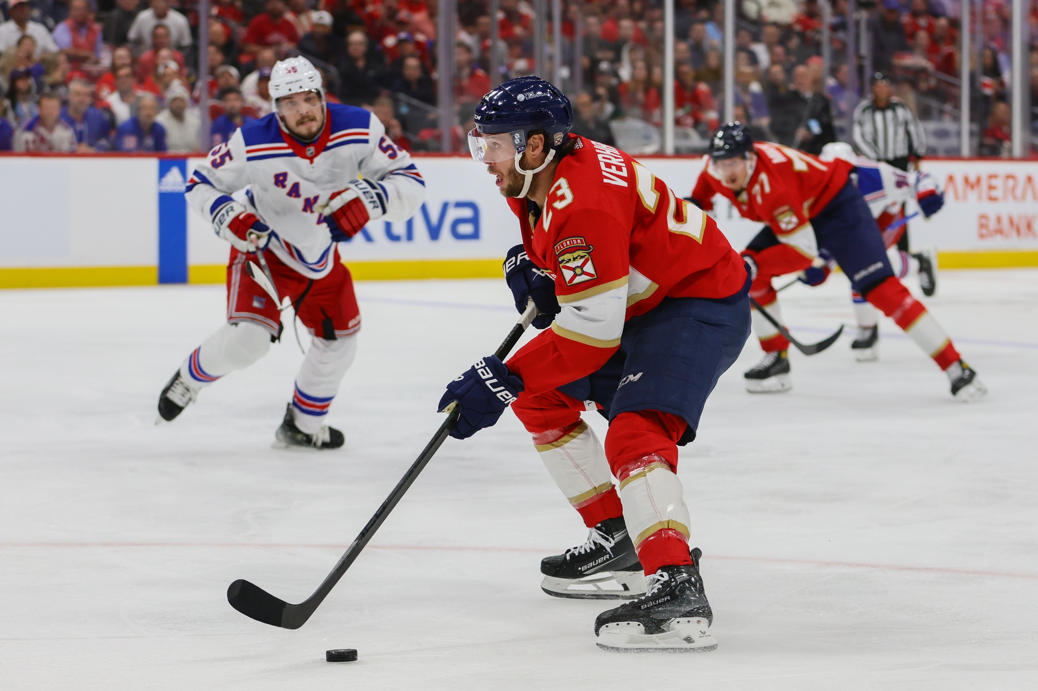 May 28, 2024; Sunrise, Florida, USA; Florida Panthers center Carter Verhaeghe (23) moves the puck against the New York Rangers during the second period in game four of the Eastern Conference Final of the 2024 Stanley Cup Playoffs at Amerant Bank Arena. Mandatory Credit: Sam Navarro-USA TODAY Sports