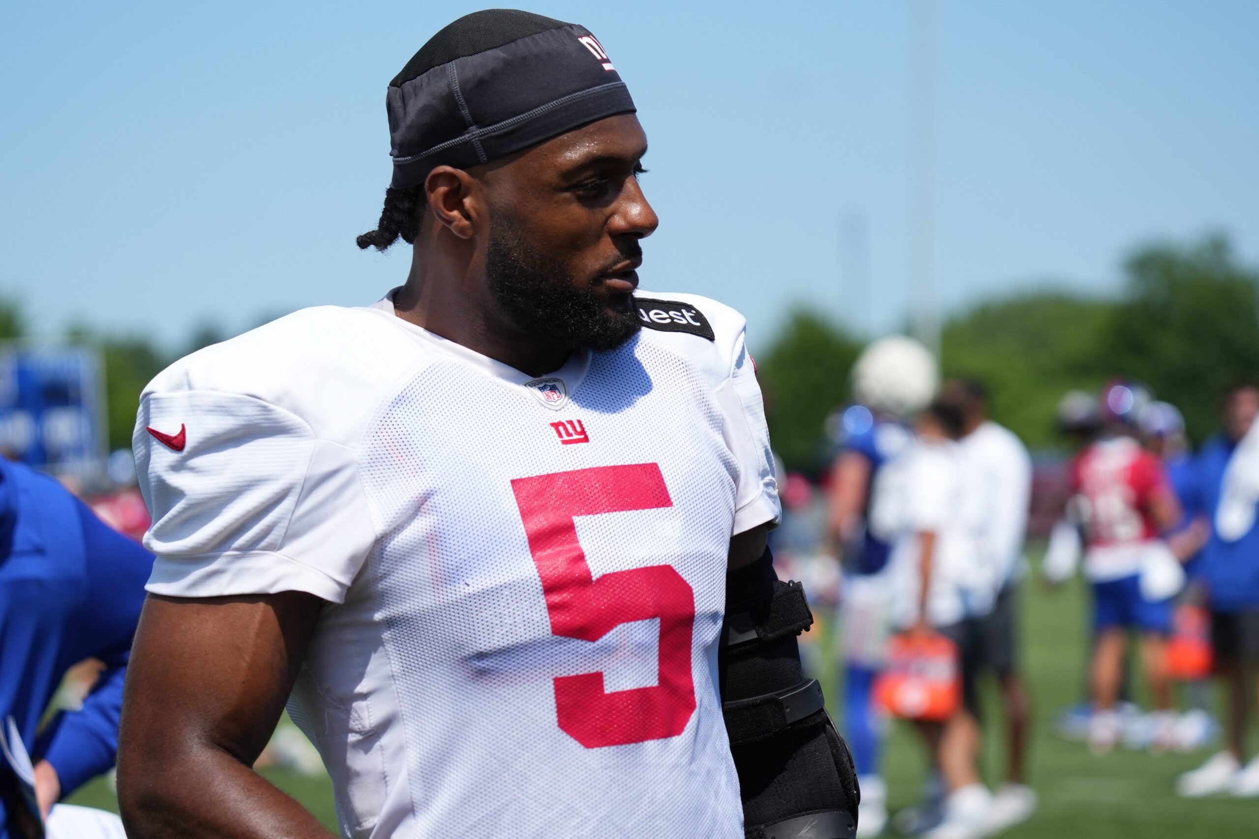 Jul 26, 2024; East Rutherford, NJ, USA; New York Giants linebacker Kayvon Thibodeaux (5) walks the sideline during training camp at Quest Diagnostics Training Center. Mandatory Credit: Lucas Boland-USA TODAY Sports