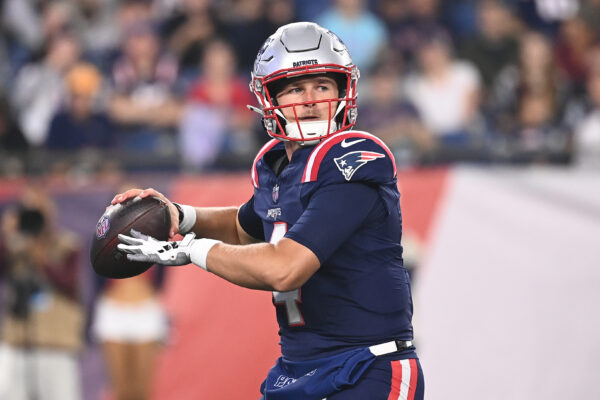 Aug 15, 2024; Foxborough, MA, USA; New England Patriots quarterback Bailey Zappe (4) looks to pass during the second half against the Philadelphia Eagles at Gillette Stadium. Mandatory Credit: Eric Canha-USA TODAY Sports